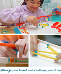 Child assembling Build Your Own Pinball Machine STEM Kit For Kids And Makers, Gumball Rally Edition, with reconfigurable parts.