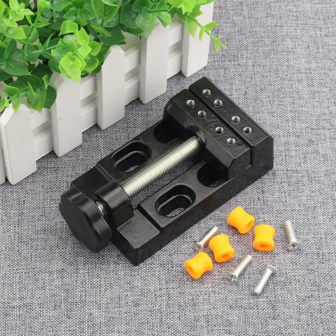 Universal Mini Drill Press Vise Clamp Set For Jewelry Making on table with screws and rubber parts