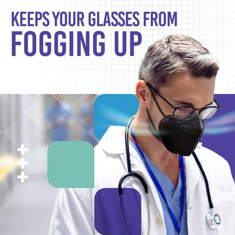 Doctor wearing KN95 Disposable Face Masks 5 Ply Protection With Extra Wide Elastic Ear Loops Over 95 Percent Filtration Individually Wrapped Mask Extender Included 50 Count Black All Day Comfort For Home Or Work while glasses remain unfogged.