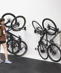 Two Pack Wall Mount Bike Rack Set For Garage Storage Holds Two Mountain Bikes Up To 70 Lb Each No Lift Vertical Hanger
