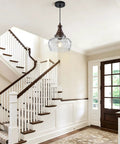 Vintage Glass Pendant Light Kitchen Island with Walnut Wood 9.8in hanging elegantly in a bright entryway with stairs.