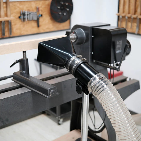 Deluxe Pro Grade Variable Height Dust Extraction Hood with Flexible Rubber Cuff connected to 102mm hose in woodworking setup