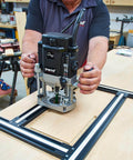 Adjustable Router Jig Frame and Guide System for Cutting Square and Rectangular Recesses, Slots, and Face Panel Molds With a Router, Large 23.6 By 23.6 Inches Working Area, Four 27.6 Inch Extrusion Rails With Dual Metric Imperial Scales Varijig in use on a wooden board.