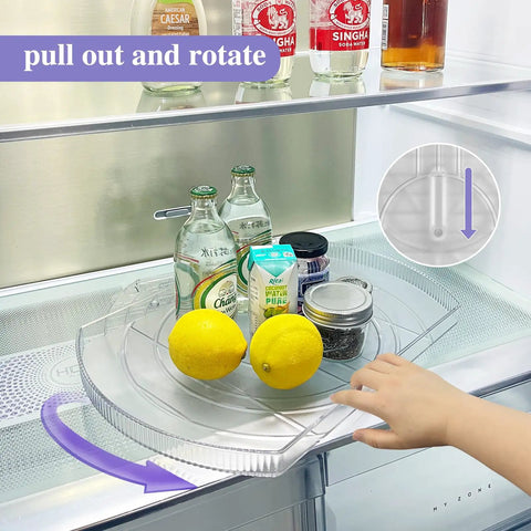 Person using Rotating Lazy Susan Turntable Organizer Rectangular 16.5 Inch By 11.1 Inch in fridge with bottles and lemons