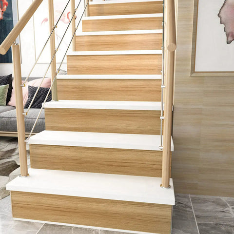 Natural Wood Peel and Stick Wallpaper on staircase steps, creating a seamless wood grain look. Self Adhesive Wood Grain Contact Paper.