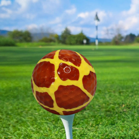 Giraffe Fullwrap Novelty Golf Ball on tee with giraffe print, part of 12 pack for gifts tourneys league events collectors yellow print