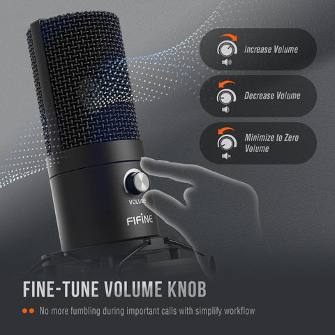Hand adjusting volume knob on Plug And Play USB Condenser Microphone Kit With Adjustable Boom Arm Stand And Shock Mount for clear audio