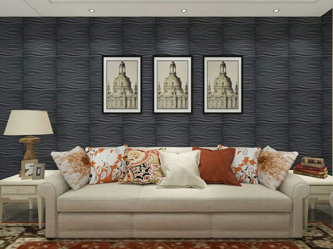 Living room with Dope 3D Leather Wall Tiles Set 6 Pack Black Wave Panels 23.6 Inch Square Each, modern loft vibe accent wall.