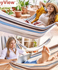 Two women relaxing in a Single Person Brazilian Hammock With Carry Bag And Strong Ropes, ultra comfortable cotton polyester.