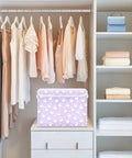 Smooth Folding Storage Bin With Grippy Handles And Snug Velcro Cover Collapsible Oxford Fabric Tote For Closets And Dorm Rooms on a shelf in a closet.