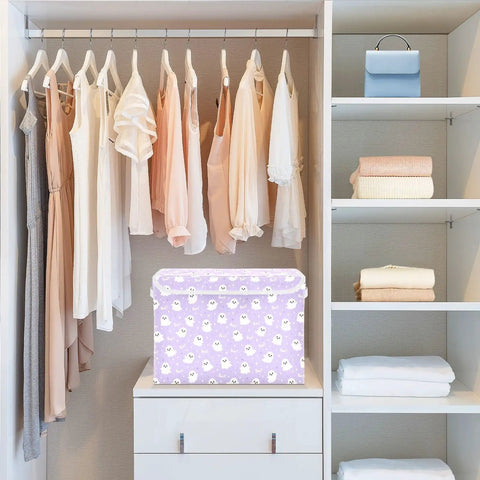 Smooth Folding Storage Bin With Grippy Handles And Snug Velcro Cover Collapsible Oxford Fabric Tote For Closets And Dorm Rooms on a shelf in a closet.