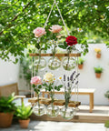 Wall Hanging Plant Propagation Station With 6 Glass Bulb Vases Two Tier Wooden Terrarium Stand for Hydroponics displayed outdoors