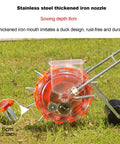 Adjustable Row Planter Seeder With Interchangeable 6 Seed Plates And Row Marker For Easy Yard Work Durable Build With Five Seeding Ports Semi Automatic Garden Seeder For Even Seed Distribution showing side view with stainless steel nozzle.
