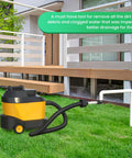 Universal Ac Drain Line Unclogger Tool And Hvac Pipe Cleaner Adapter with wet vacuum hose on grass for effective clog removal.