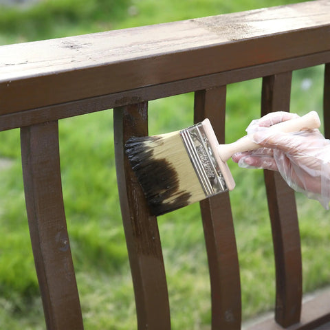 Wide 5 Inch Deck Stain Brush With Wooden Handle applying stain on wooden railing for smooth, even finish
