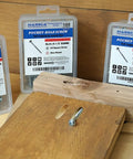 Pocket Hole Screw Set Self Tapping Zinc Plated Wood Screws With Washer Head For Fine Thread And Coarse Thread In Inch Sizes From One To Two And A Half Inches Silver Metallic Great For DIY Projects displayed with wood panel and packaging.