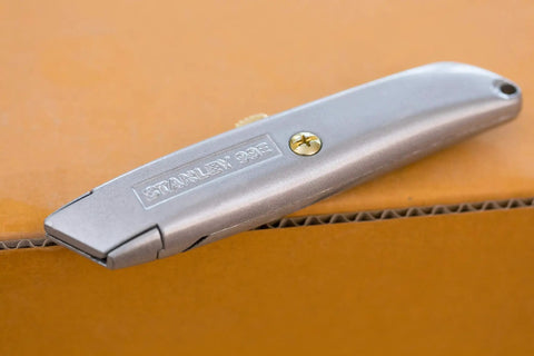 Everyday Utility Knife With Retractable Blade For Safe Precise Cutting In DIY Projects Cardboard Boxes And Craft Tasks