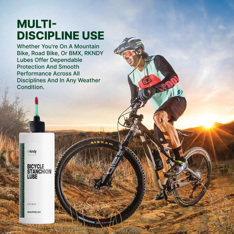 Cyclist using Bicycle Stanchion Lube for smooth performance in diverse weather conditions with mountain, road, gravel rides.