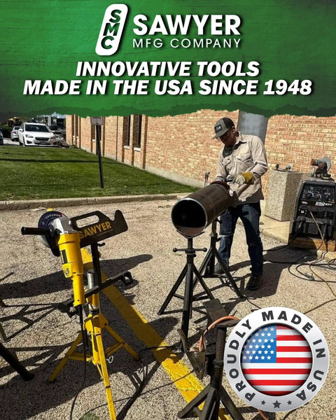 Worker using industrial equipment with Sawyer MFG branding at an outdoor site, highlighting innovative tools made in the USA.