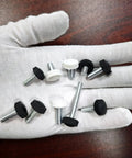 Heavy Hitter Black M5x8mm Threaded Knurled Thumb Screws Zinc Plated Carbon Steel Clamping Knobs on gloved hand.