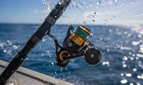 Spinfisher VII 3500 Saltwater Spinning Reel With IPX5 Seal Tough Aluminum Spool Left Right Handle Position on a boat in use