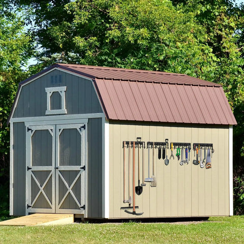 Heavy Duty Metal Garage Tool Organizer Wall Mount Kit Four Pack with tools mounted on garden shed exterior
