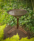 Tranquility 20 Inch Copper Bird Bath with pure copper basin bronze finish and durable aluminum base in a garden setting.