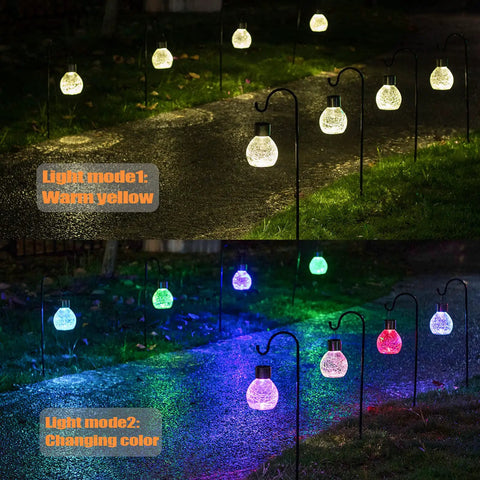 4 Pack Solar Lanterns With Shepherd Hooks No Wiring Easy Setup Outdoor Color Changing Crackle Glass 3 Lumens Waterproof Garden Lights showing warm yellow and changing color modes along a pathway at night.