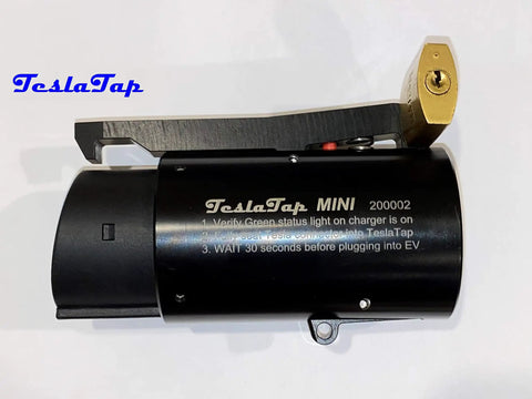 Slick Tesla To J1772 Adapter Sixty Amp Plug And Play Setup Handles Wall Connectors And Destination Stations Like A Charm Built Tough For Everyday Electric Travel Needs On The Road, showcasing the TeslaTap Mini charging adapter.