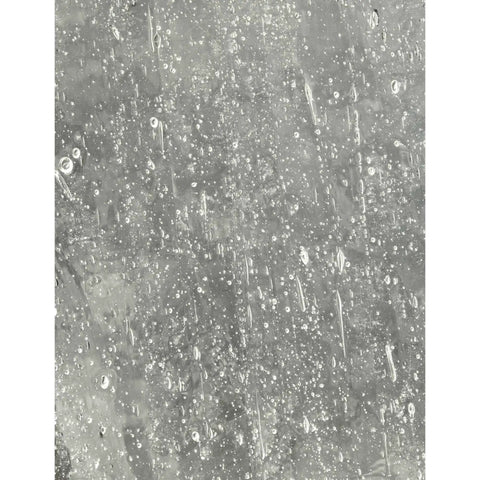 Clear seeded glass detail of Roman Coach Style 1 Light Outdoor Wall Lantern In Textured Black With Clear Seeded Glass For Classic, Weatherproof Porch Lighting Upgrade