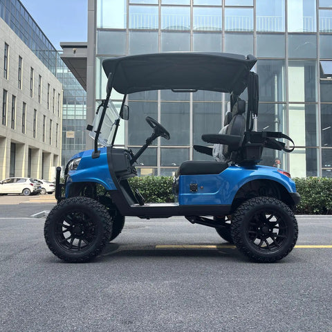 Pick Up Speed Without Breaking A Sweat On This Reliable Two Seater Electric Golf Cart Featuring A Cool Blue Exterior Black Hardtop Canopy Bright Led Headlights Full Windshield And Sturdy Bumper For Lazy Weekend Cruising, side view in urban setting.