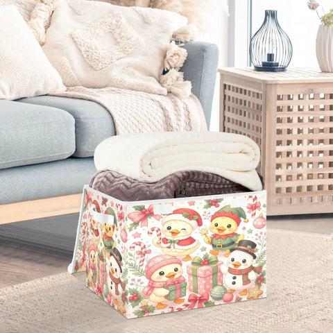 Heavy Duty Foldable Storage Bin With Flip Top Lid And Reinforced Handles For Home Bedroom Office Shelves holding blankets.