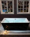 Contemporary 67 Inch Freestanding Acrylic Soaking Bathtub With Matte Black Drain And Overflow Deep Luxury Spa Tub For Modern Bathrooms with water.