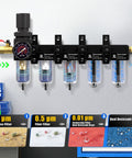 One Quarter Inch NPT Five Stage Air Dryer For Air Compressors With Brass Filter And Coalescing Filter Dual Desiccant Dryer And Air Regulator Air Compressor Water Separator System With Semi Auto Drain 150 PSI Black, wall-mounted with detailed filtration stages and brass components.