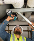 Worker using Beefy Impact Driver Socket Adapter Quarter Inch Square Drive Two Inch Length With Rock Solid Retention Ball