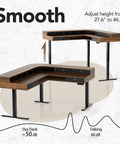 Top Shelf Badass Corner Electric Standing Desk With Spacious Storage Drawers And Clean Power Strip Tray Smooth Height Adjustable Gaming Table in walnut.