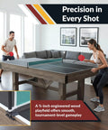 Two people playing table tennis on a 7 Foot Pool Table Combo With Benches Table Tennis And Dining Tops Billiards Set Ping Pong Ready.
