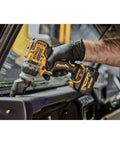 Compact 12V Cordless Drill Driver Workhorse With Offset And Right Angle Adapter Heads For Tight Squeezes No Frills Bare Unit Job Site Ready Tough As Nails Ergonomic Design High Torque Output used for automotive repair.