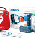 Philips HeartStart Home AED defibrillator kit with training pads cartridge and red carrying case