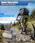 Cyclist riding with 100Cc Bicycle Engine Kit For 26 To 28 Inch Bikes 2 Stroke Gas Motor Conversion in quiet operation mode