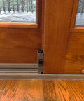 Installed Auxiliary Foot Lock For Gliding Patio Doors Compatible With Andersen OEM Part 1997220 on wooden door