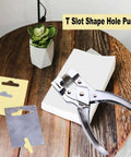 Heavy Duty T Slot Hole Punch Handheld Cutter for crafting on a wooden table with sample tags and cards, zinc alloy material