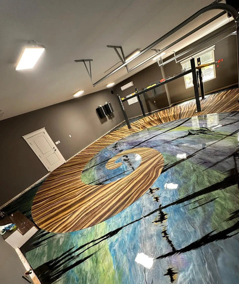 Squire Two Zero Reloaded Pro Grade Sealer For Concrete Epoxy Natural Stone Vct Lvt Lvp Tile And Grout Substrates With Gloss Finish One Quart Coverage Up To 250 Sqft applied to a colorful artistic garage floor.