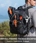 KarryAll Fishing Tackle Backpack With Rod Holder And 4 Tackle Boxes, 40/26L, Black, worn by a person outdoors, showing fishing gear.