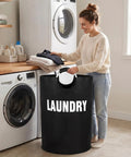 Person using 160L XXL Collapsible Laundry Basket With Aluminum Handle And Soft Grip Waterproof 600D Oxford Double Layer Laundry Bag Foldable Hamper