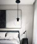 Industrial Farmhouse Globe Pendant Light Fixture With Adjustable Cord Black Hanging Ceiling Chandelier shown in bedroom setting