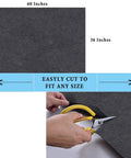 Heavy Duty Garage Floor Mat 36x60 Inches Absorbs Oil And Liquids With Waterproof Backing being cut with scissors for custom fit