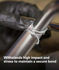Gloved hands applying DP460NS Epoxy Adhesive White 50 mL Cartridge For Metal Wood Ceramic Glass And Select Plastics to metal pipe joint.