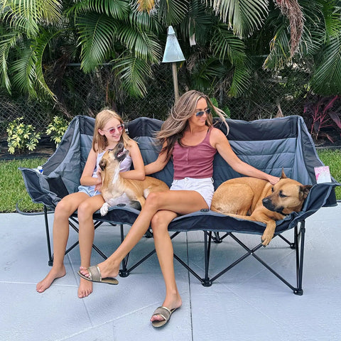 Woman and child with dogs on Three Person Folding Camping Chair Couch With Padded Comfort Oversized Outdoor Loveseat Heavy Duty