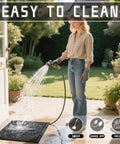 Woman washing Heavy Duty Non Slip Outdoor Doormat For Front Door And Entryway Waterproof Sturdy Retro Mat For Garage And Patio Easy Clean 29.5 By 17 Inches Grey Durable Dirt Trap For All Weather Use with hose in garden